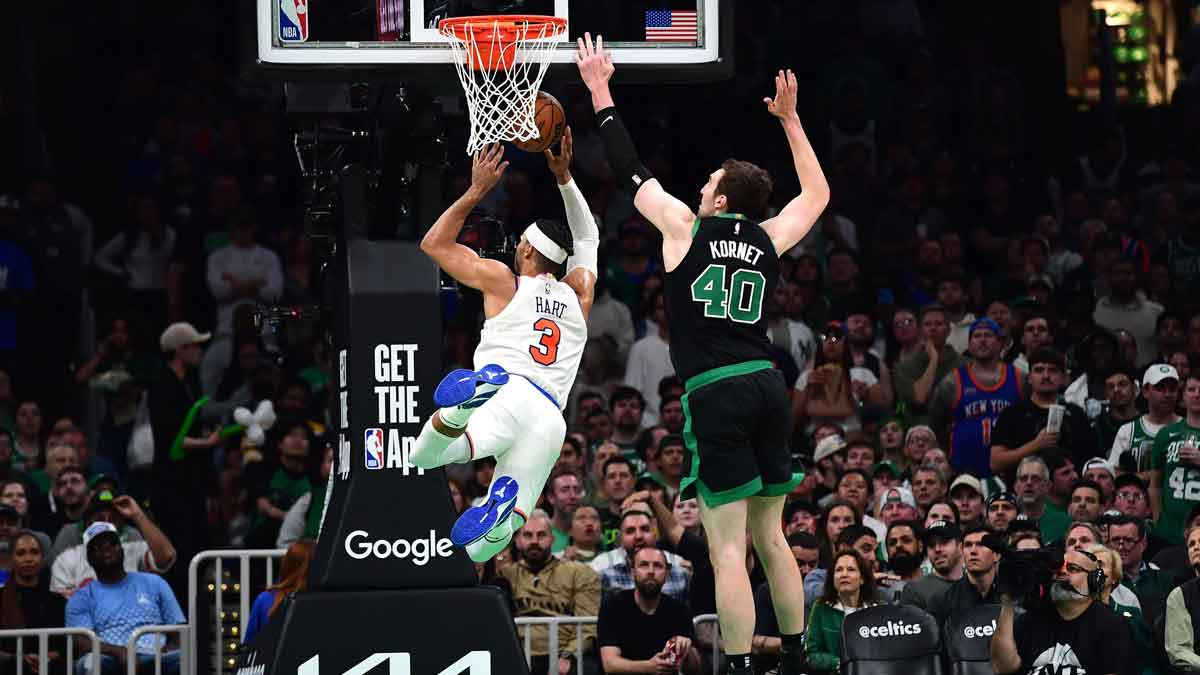 Boston Celtics center Luke Kornet (40) fouls New York Knicks guard Josh Hart (3) in the second half during game five of the second round for the 2025 NBA Playoffs at TD Garden.