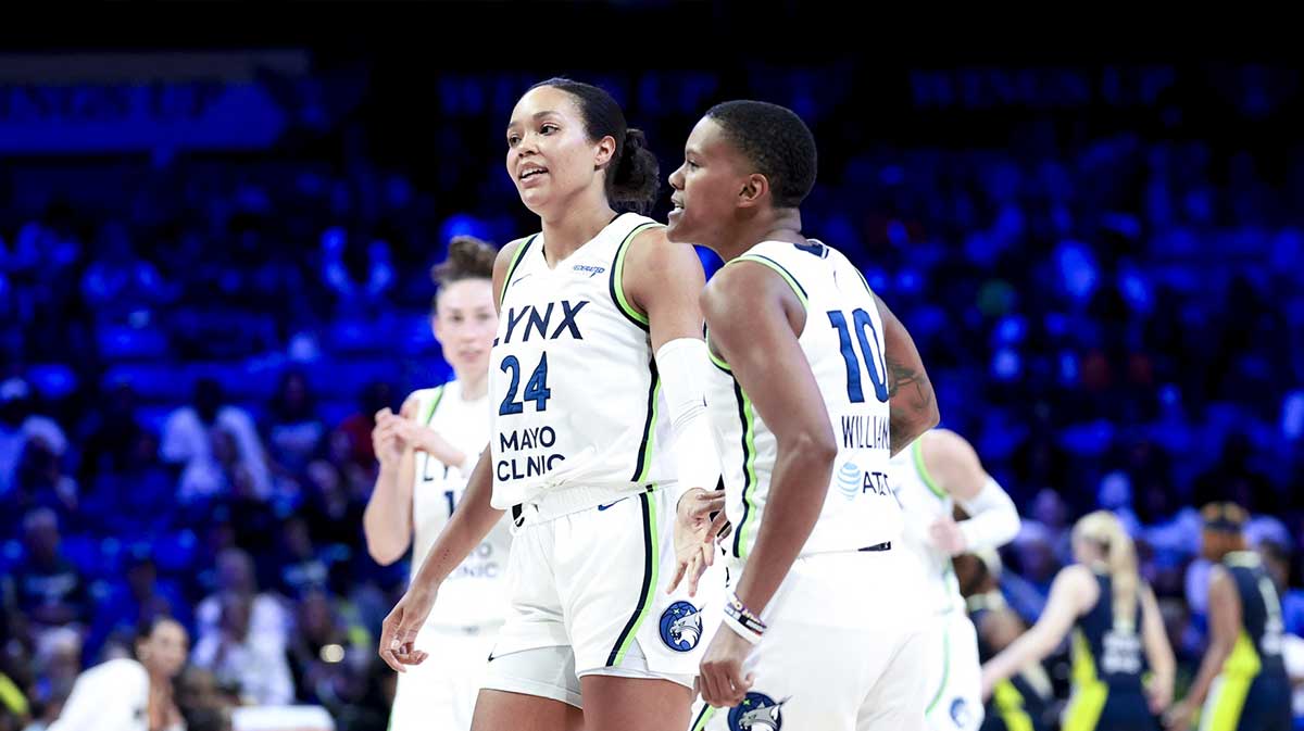 Minnesota Lynx forward Napheesa Collier celebrates with Minnesota Lynx guard Courtney Williams against the Dallas Wings during the second half at College Park Center.