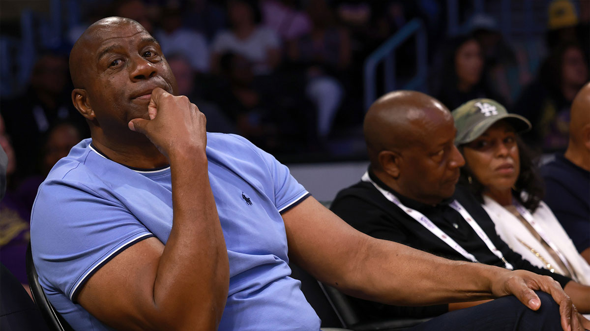 Magic Johnson attends a WNBA game between the Los Angeles Sparks and the Minnesota Lynx at Crypto.com Arena.