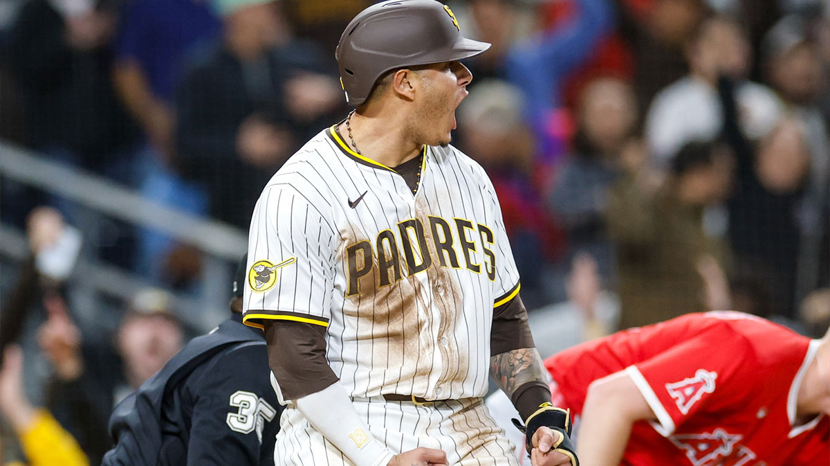 San Diego Padres third baseman Manny Machado (13) celebrates after scoring a run during the eighth inning against the Los Angeles Angels at Petco Park.