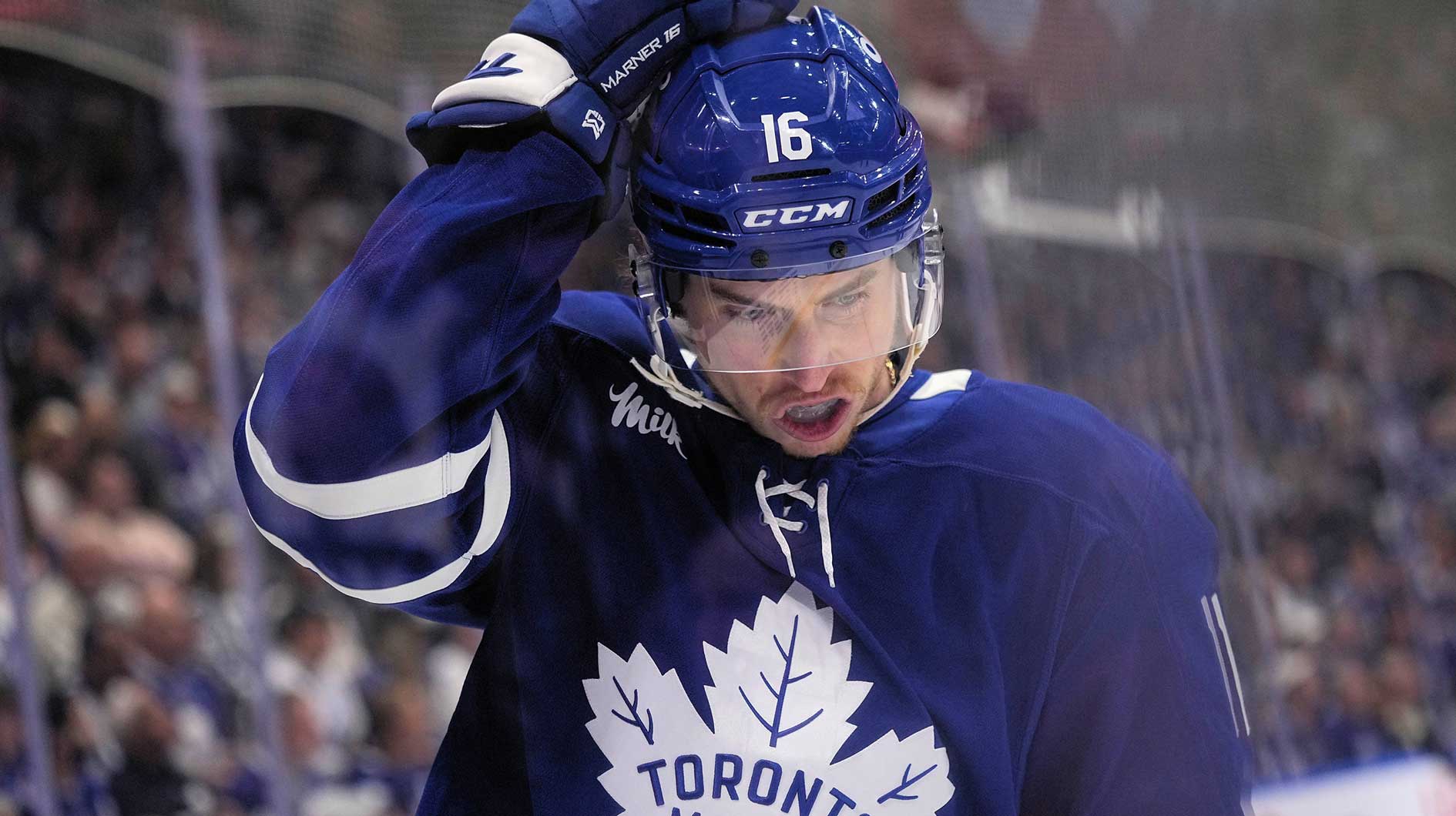 Toronto Maple Leafs forward Mitch Marner (16) adjusts his helmet after a play against the Florida Panthers during the first period of game seven of the second round of the 2025 Stanley Cup Playoffs at Scotiabank Arena.