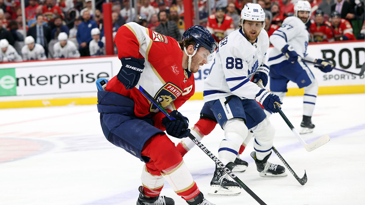 Florida Panthers left wing Matthew Tkachuk (19) and Toronto Maple Leafs right wing William Nylander (88) skate to control the puck during the third period in game four of the second round of the 2025 Stanley Cup Playoffs at Amerant Bank Arena.