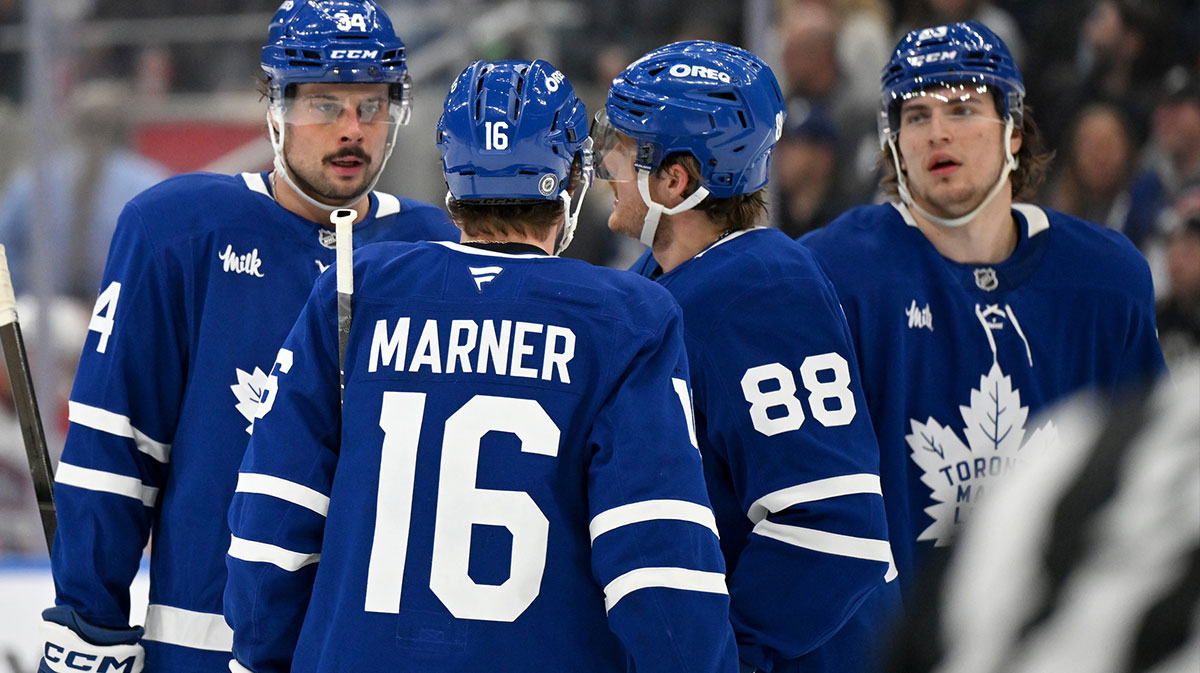 Toronto Maple Leafs forward Auston Matthews (34) speaks with forwards Mitch Marner (16) and William Nylander (88) and Matthew Knies (23) as they prepare for a powerplay against the Montreal Canadiens in the third period at Scotiabank Arena.