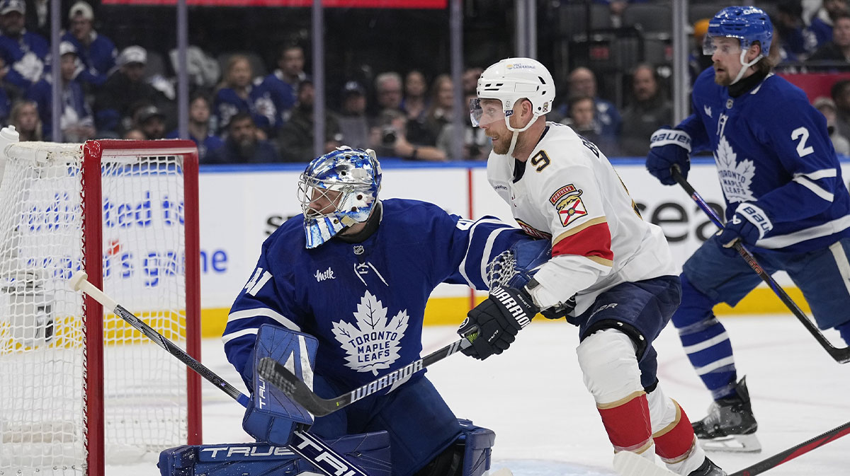 Toronto Maple Leafs goaltender Anthony Stolarz (41) and Florida Panthers forward Sam Bennett (9) battle for position in front of the goal during the second period of the second round of the 2025 Stanley Cup Playoffs at Scotiabank Arena.