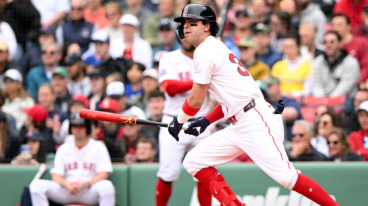 Boston Red Sox shortstop Marcelo Mayer (39) hits a single against the Baltimore Orioles for his first MLB hit during the second inning at Fenway Park.