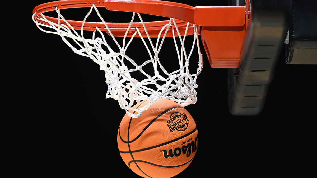 The March Madness logo is seen on a basketball during the NCAA tournament midwest regional practice day at Lucas Oil Stadium.