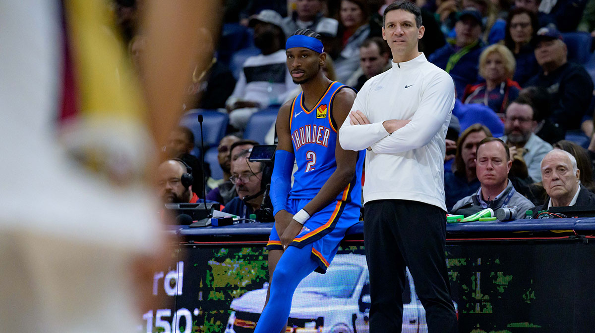 Oklahoma City Thunder head coach Mark Daigneault and Oklahoma City Thunder guard Shai Gilgeous-Alexander (2) watch the New Orleans Pelicans during the first half at Smoothie King Center.