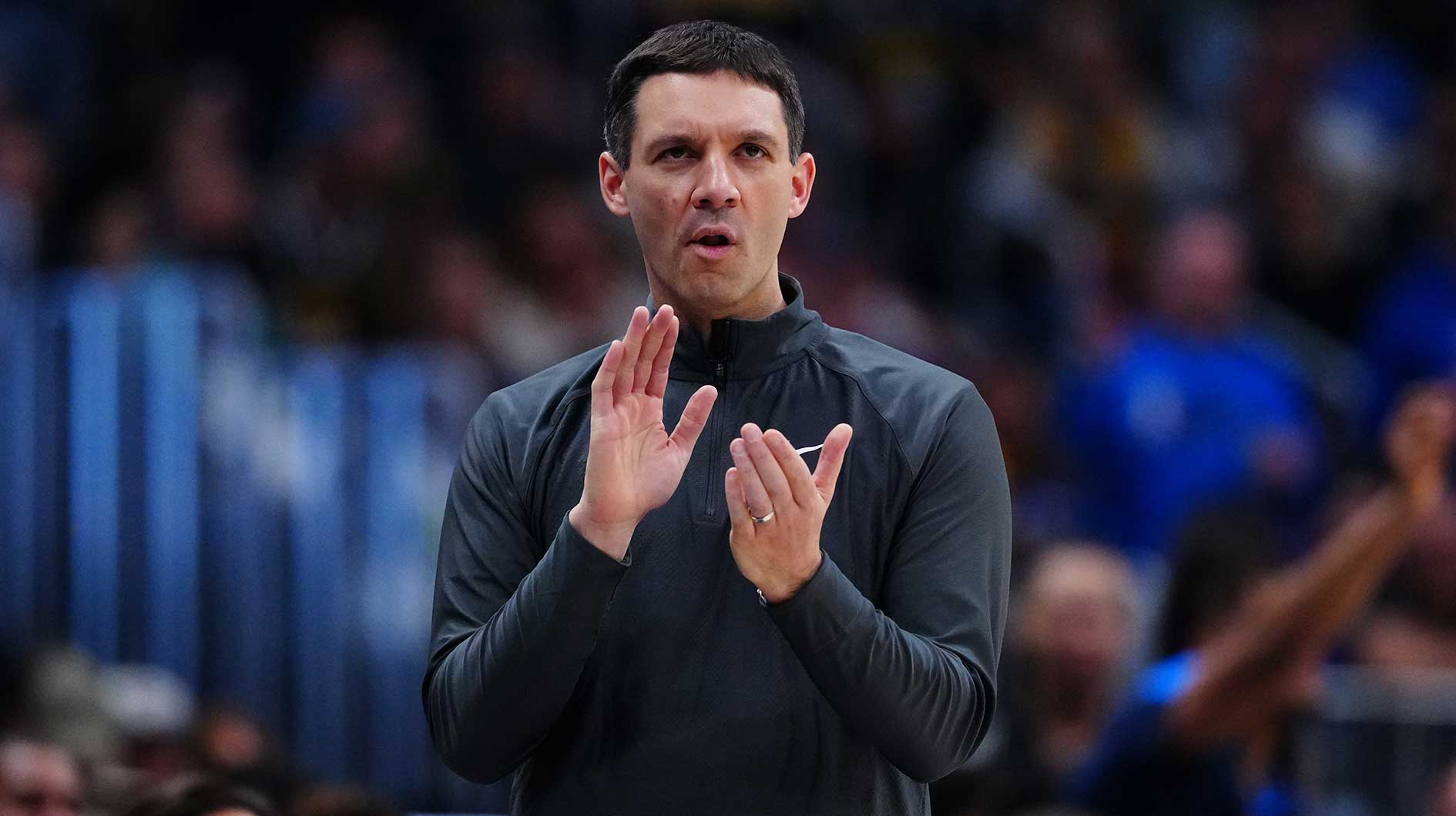 Oklahoma City Thunder head coach Mark Daigneault claps in the first half against the Denver Nuggets during game three of the second round for the 2025 NBA Playoffs at Ball Arena.