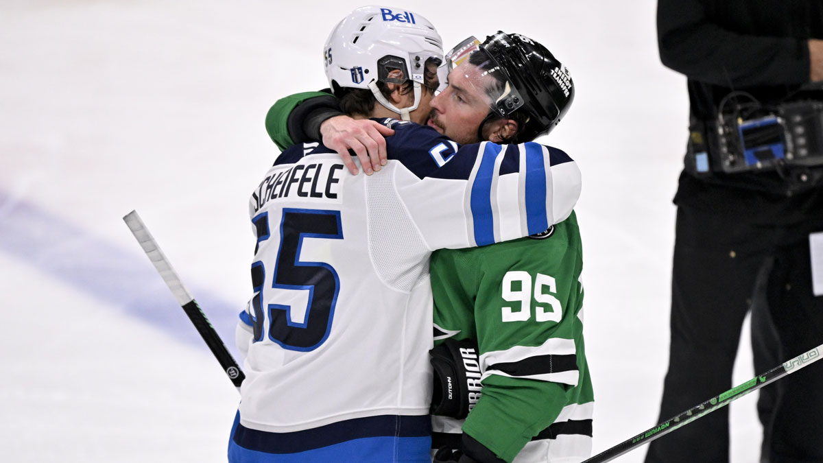 Winnipeg Jets center Mark Scheifele (55) hugs Dallas Stars center Matt Duchene (95) after the Stars defeat the Jets in the overtime period in game six of the second round of the 2025 Stanley Cup Playoffs at American Airlines Center.