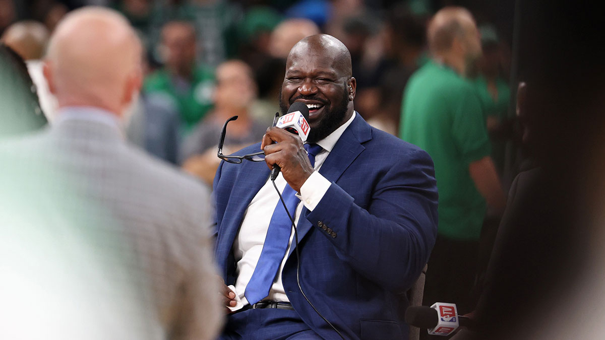 Jun 9, 2024; Boston, Massachusetts, USA; NBA former player Shaquille O'Neill laughs on the NBA TV set before game two of the 2024 NBA Finals between the Boston Celtics and the Dallas Mavericks at TD Garden. Mandatory Credit: Peter Casey-Imagn Images