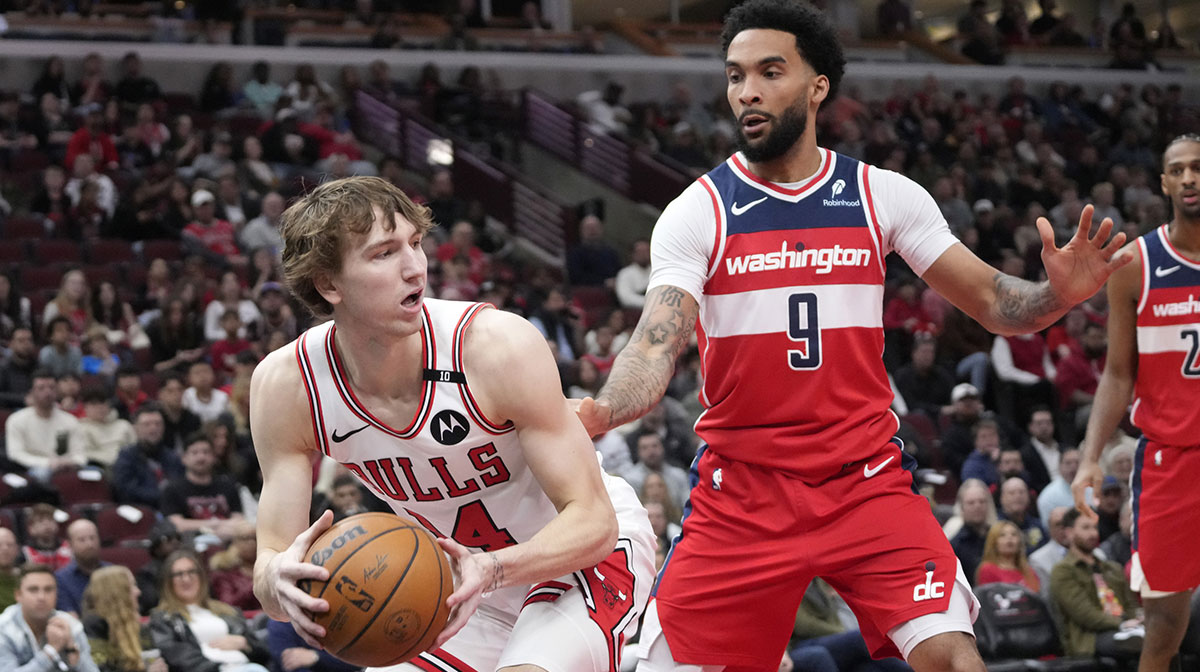 Washington Wizards forward Justin Champagnie (9) defends Chicago Bulls forward Matas Buzelis (14) during the first quarter at United Center.