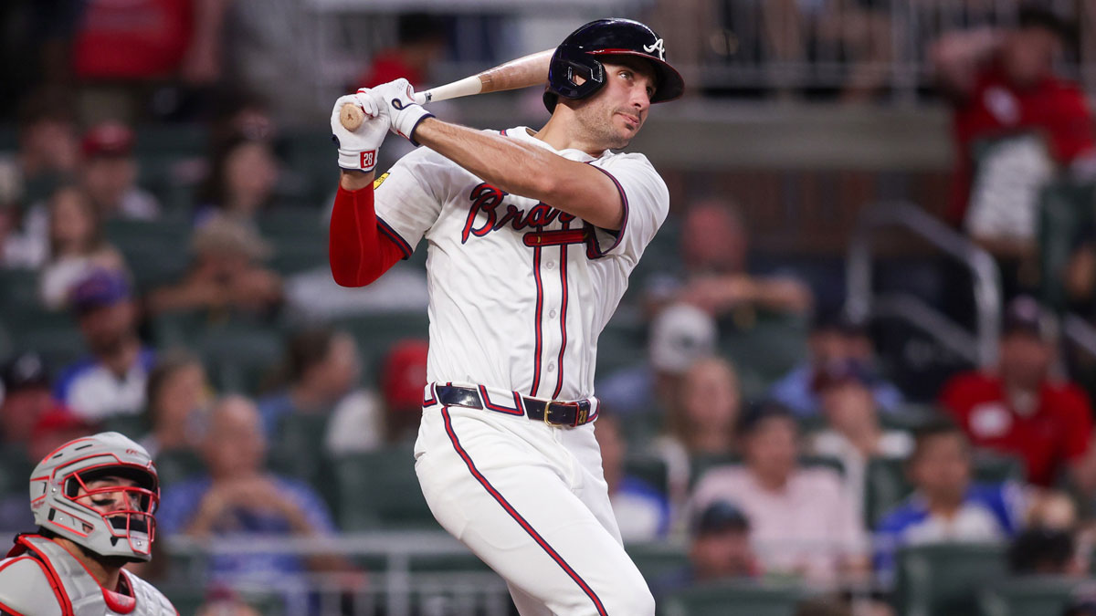 Atlanta Braves first baseman Matt Olson (28) hits a single against the Cincinnati Reds in the sixth inning.