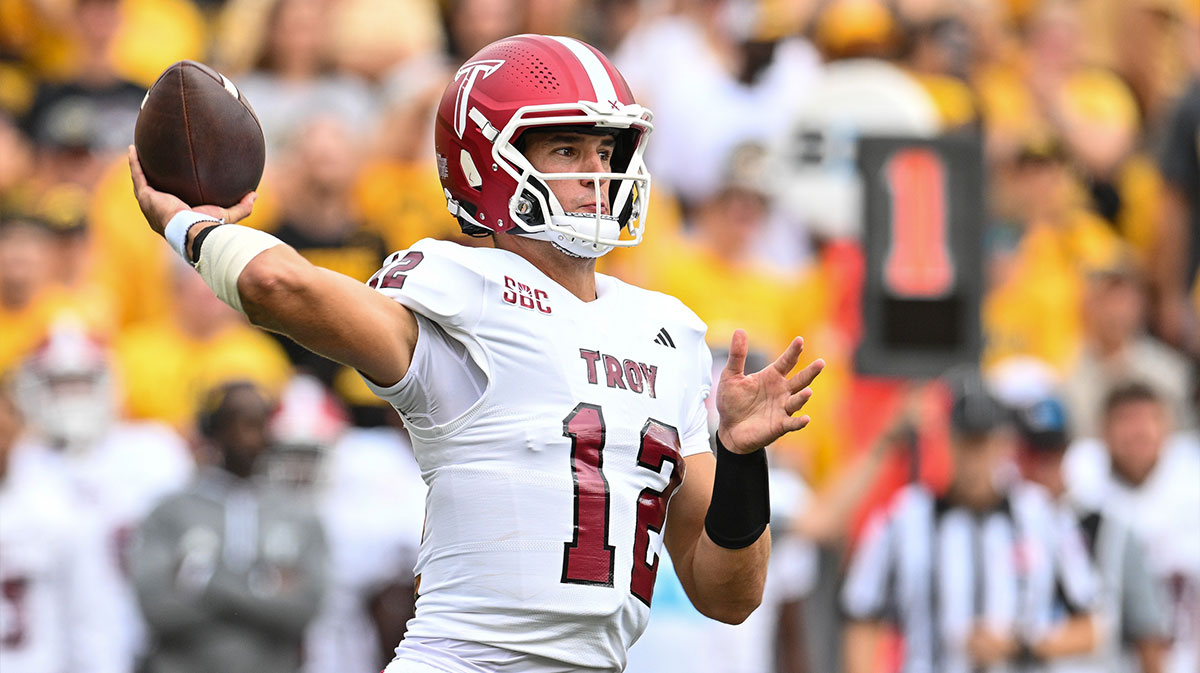 Troy Trojans transfer quarterback Matthew Caldwell (12) throws a pass during the first quarter against the Iowa Hawkeyes at Kinnick Stadium.