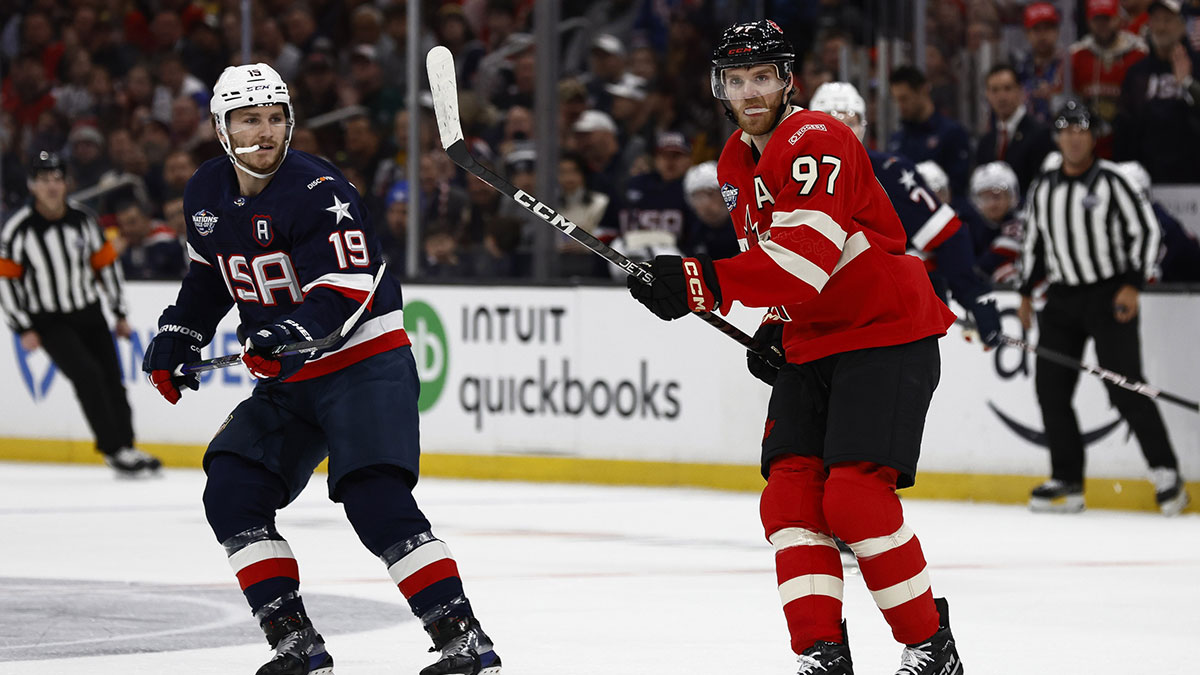 Team Canada forward Connor McDavid (97) and United States forward Matthew Tkachuk (19) during the 4 Nations Face-Off ice hockey championship game at TD Garden.
