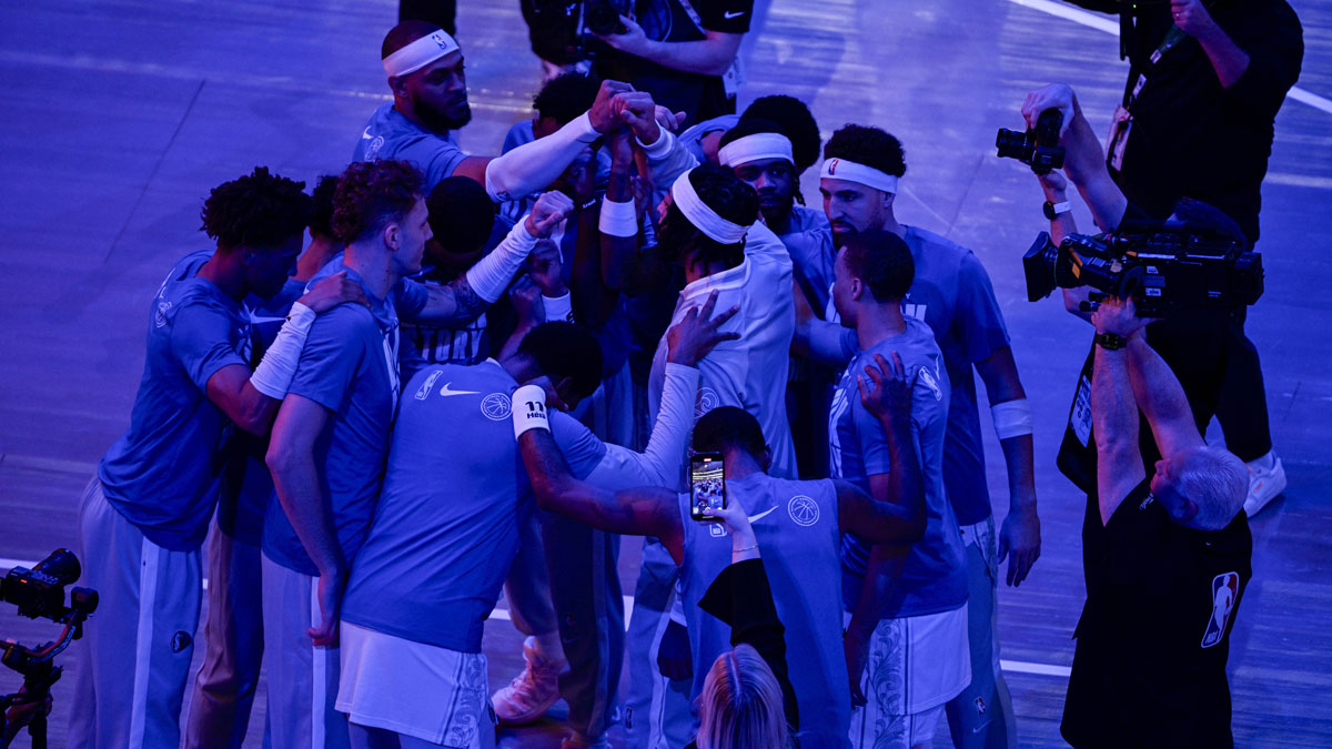 The Dallas Mavericks huddle before the game between the Mavericks and the Houston Rockets at the American Airlines Center.