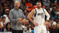 Mavericks head coach Jason Kidd with guard Luka Doncic (77) against the Phoenix Suns in the first half at Footprint Center