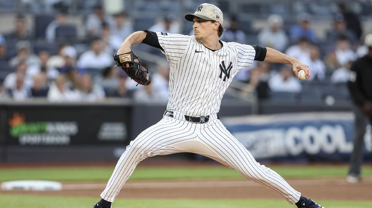 New York Yankees starting pitcher Max Fried (54) pitches in the first inning against the New York Mets at Yankee Stadium.
