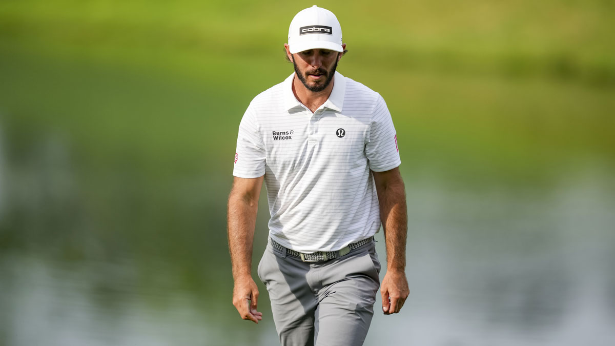 Max Homa walks up to the fifteenth hole fairway during the second round of the PGA Championship golf tournament at Quail Hollow