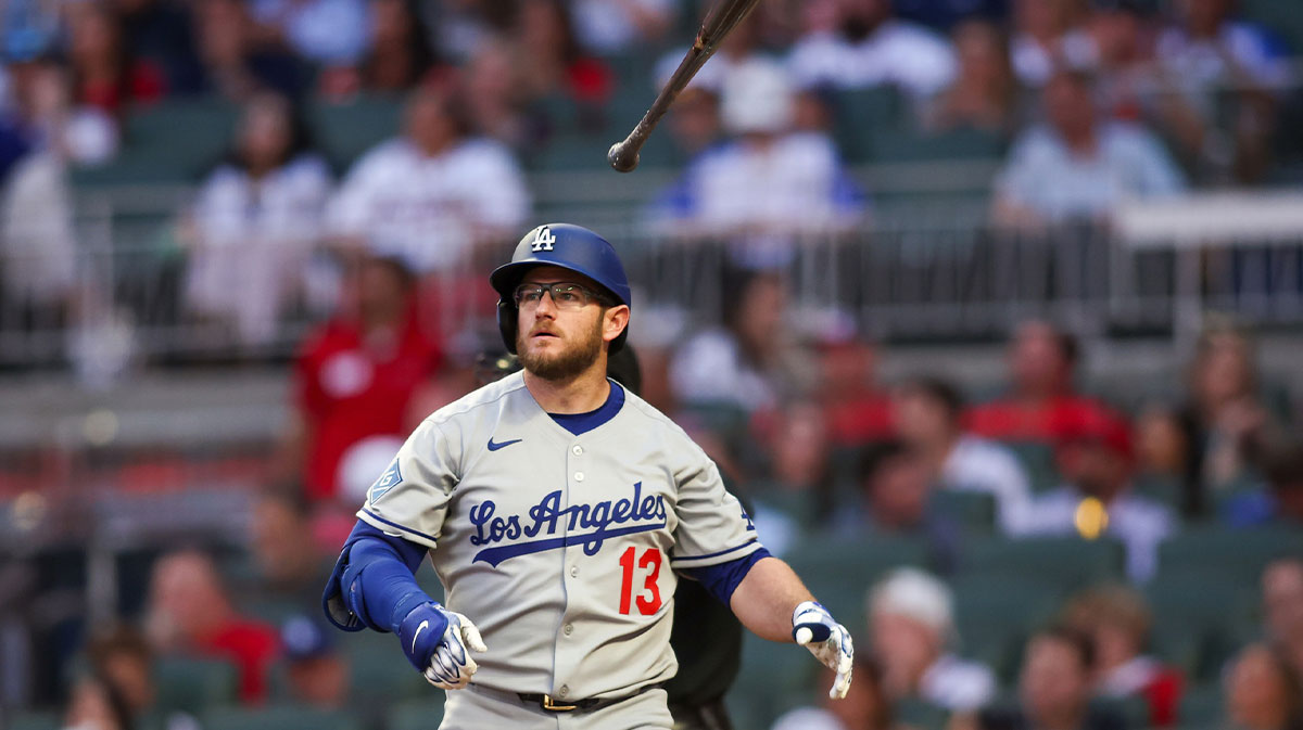 May 2, 2025; Atlanta, Georgia, USA; Los Angeles Dodgers third baseman Max Muncy (13) throws a bat after a strikeout against the Atlanta Braves in the fourth inning at Truist Park. Mandatory Credit: Brett Davis-Imagn Images