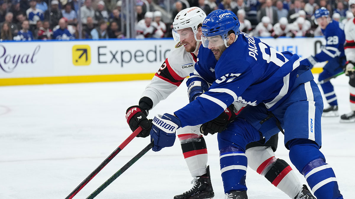 Toronto Maple Leafs left wing Max Pacioretty (67) battles for the puck with Ottawa Senators defenseman Thomas Chabot (72) in the third period during game five of the first round of the 2025 Stanley Cup Playoffs at Scotiabank Arena.