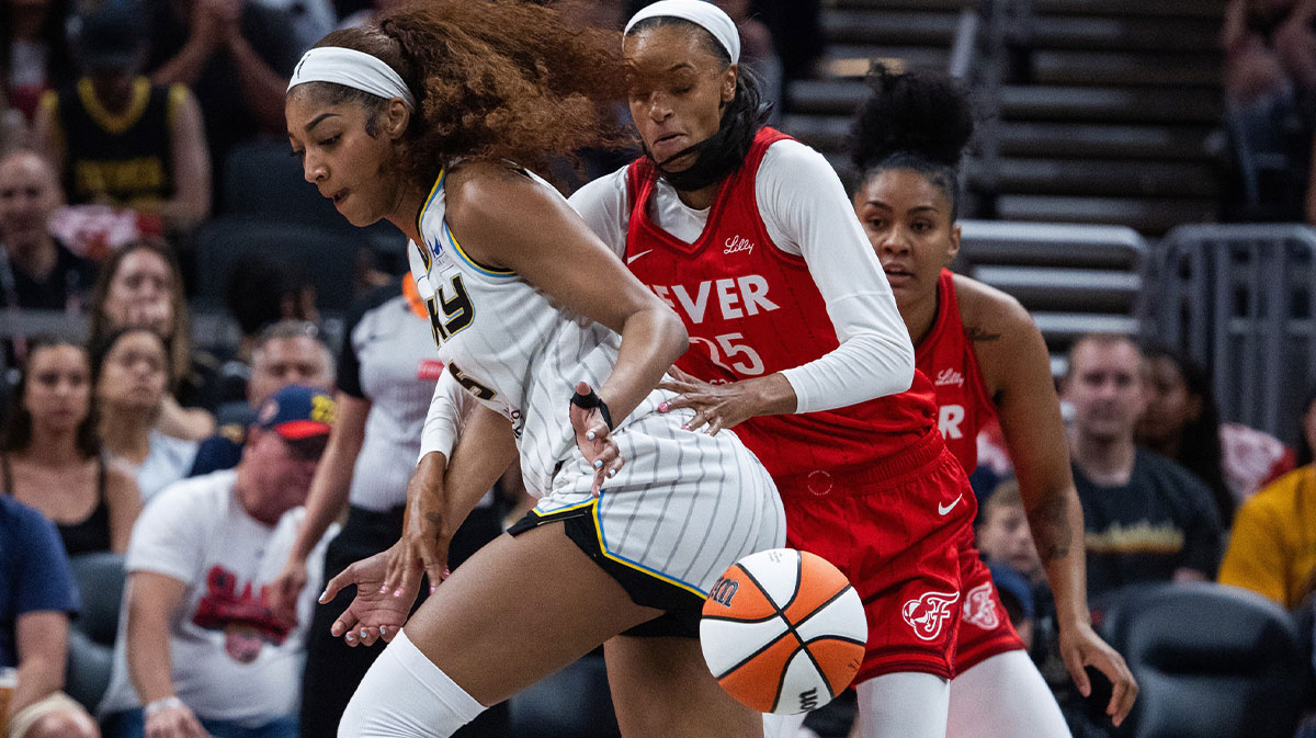 Indiana Fever forward DeWanna Bonner (25) steals the ball from Chicago Sky forward Angel Reese (5) in the first half at Gainbridge Fieldhouse.
