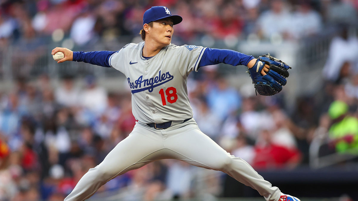 Los Angeles Dodgers starting pitcher Yoshinobu Yamamoto (18) throws against the Atlanta Braves in the second inning at Truist Park.