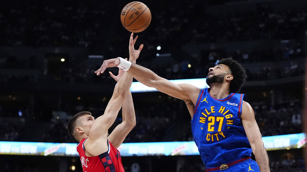 Denver Nuggets goalkeeper Jamal Murray (27) defends the clippers goalkeeper Bogdan Bogdanovic (10) in the second quarter in the first round game for the NBA 2025 qualifiers in Ball Arena.