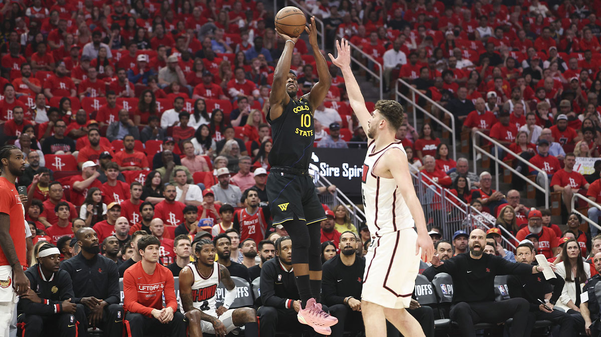 Golden State Warriors forward Jimmy Butler III (10) shoots the ball over Houston Rockets center Alperen Sengun (28) during the first half of game seven of the first round for the 2025 NBA Playoffs at Toyota Center.