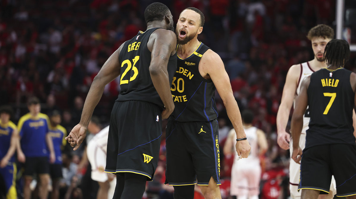 Golden State Warriors guard Stephen Curry (30) celebrates with forward Draymond Green (23) after a play during game seven of the first round for the 2025 NBA Playoffs against the Houston Rockets at Toyota Center.