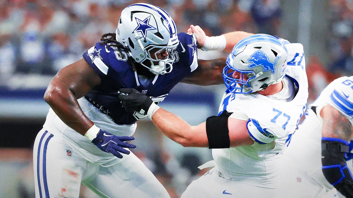 Dallas Cowboys defensive tackle Mazi Smith (58) and Detroit Lions center Frank Ragnow (77) battle during the second quarter at AT&T Stadium.