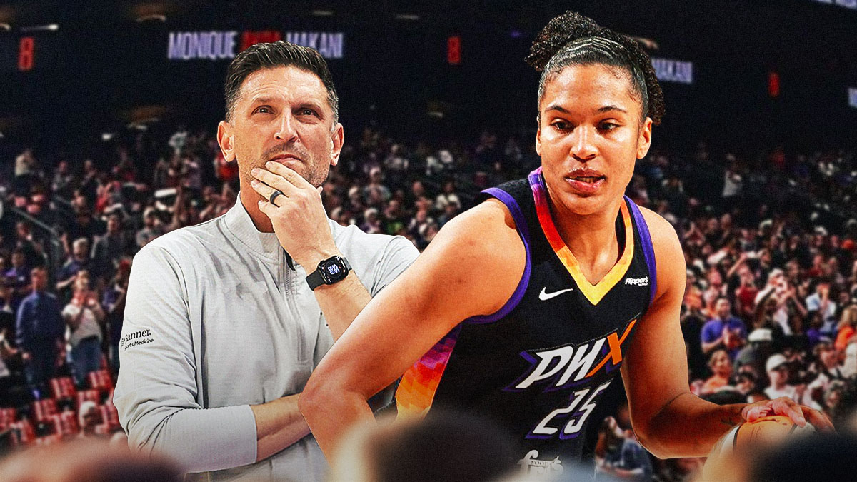 Phoenix Mercury head coach Nate Tibbetts in a coaching stance, with Alyssa Thomas next to him, and a background of inside the Mercury's home arena.
