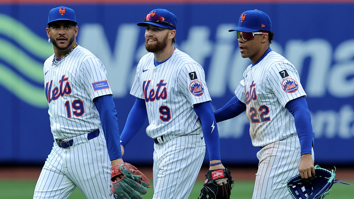 New York Mets center fielder Jose Siri (19) and left fielder Brandon Nimmo (9) and right fielder Juan Soto (22) celebrate after defeating the Toronto Blue Jays during the ninth inning at Citi Field.