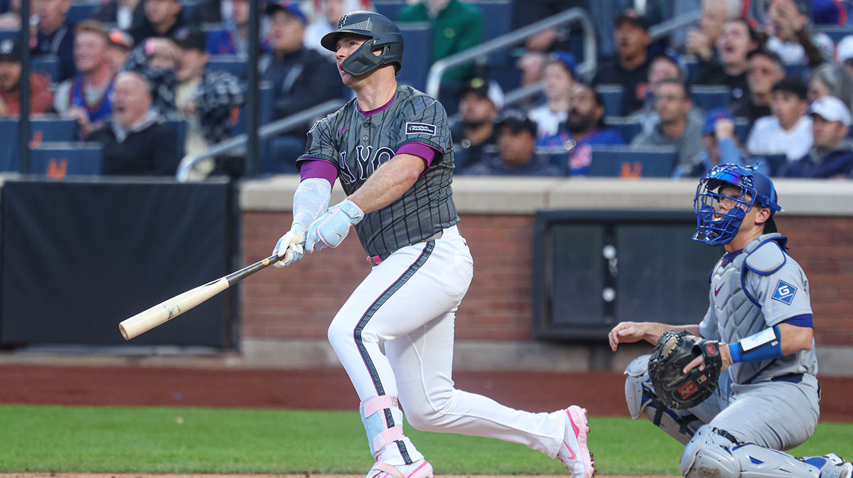 New York Mets first baseman Pete Alonso (20) hits a two run home run during the first inning against the Los Angeles Dodgers at Citi Field.
