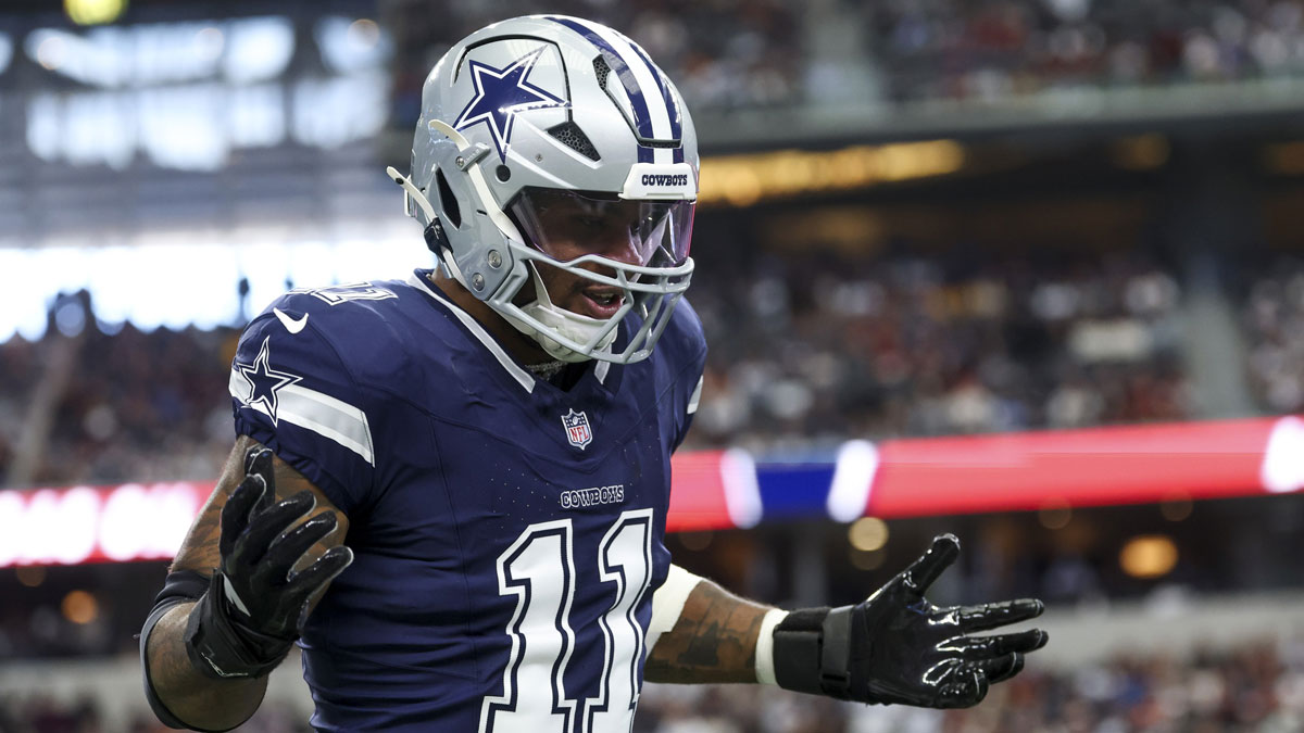 Dallas Cowboys linebacker Micah Parsons (11) celebrates after a sack during the first quarter against the Washington Commanders at AT&T Stadium.