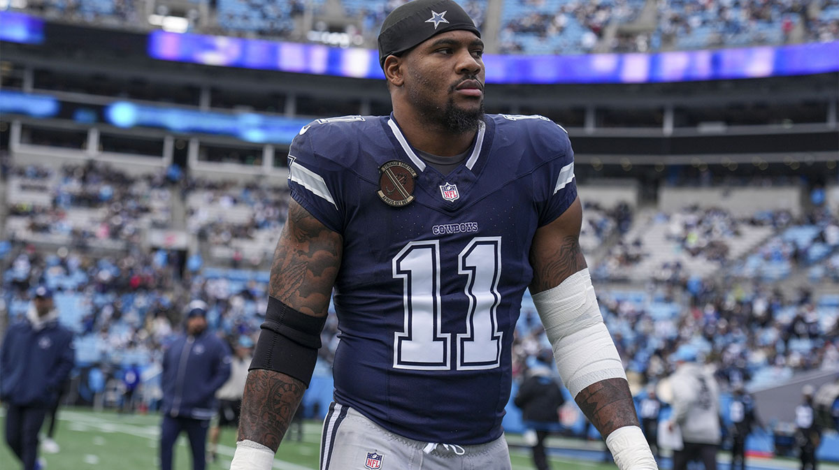 Dallas Cowboys linebacker Micah Parsons (11) walks onto the field during the first quarter against the Carolina Panthers at Bank of America Stadium.