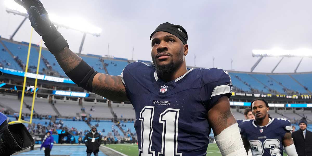 Dallas Cowboys linebacker Micah Parsons (11) walks off the field after the game at Bank of America Stadium.