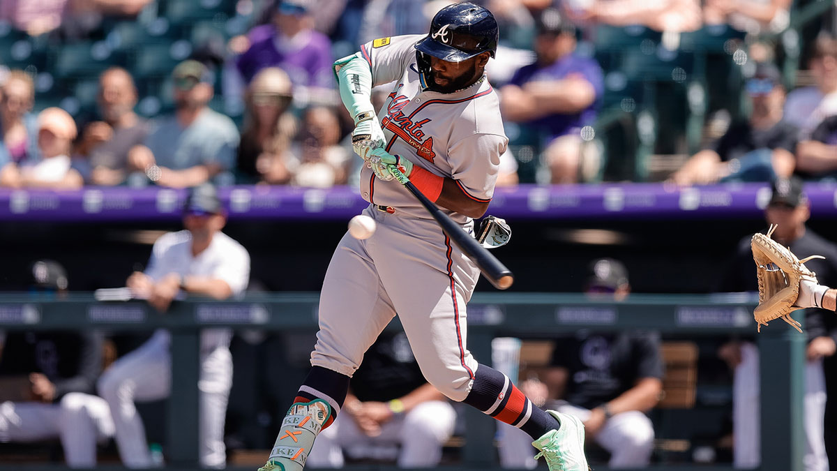 Atlanta Braves center fielder Michael Harris II (23) hits a ground out RBI in the third inning against the Colorado Rockies at Coors Field