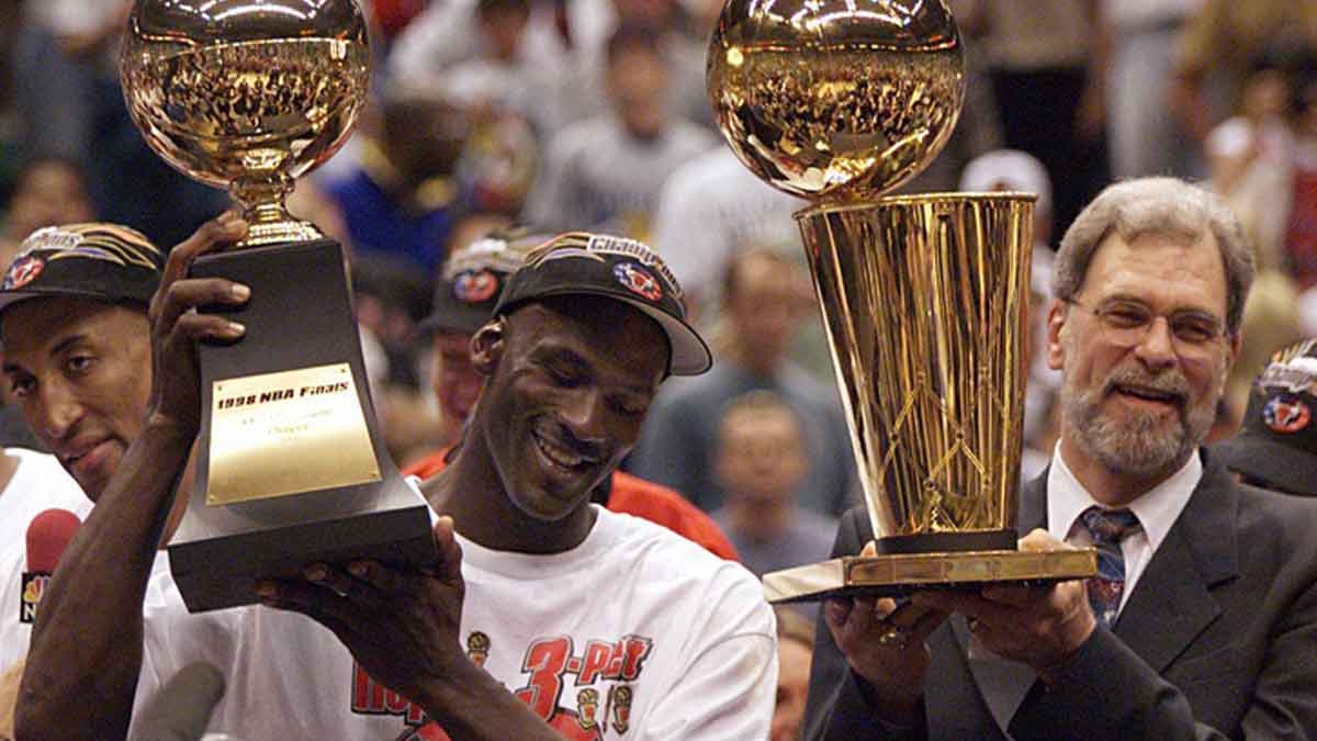 Michael Jordan and Phil Jackson celebrate after finishing off the Jazz to win the 1998 championship. 2020-04-16 Jordan Jackson Mandatory Credit: © Robert Hanashiro, USA TODAY, USA TODAY via Imagn Content Services, LLC