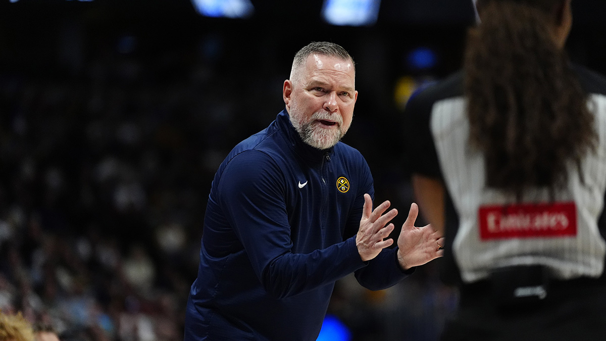 Denver Nuggets head coach Michael Malone reacts towards referee Danielle Scott (87) in the second half against the Indiana Pacers at Ball Arena.