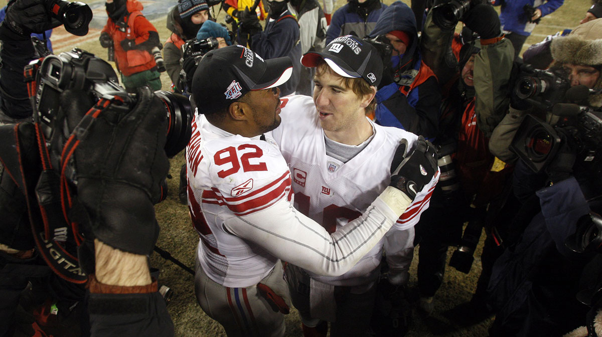Giants legend Michael Strahan duking it out with Eli Manning for ownership stake