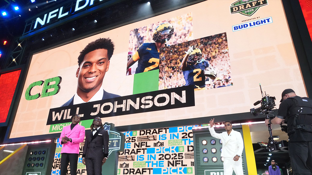 Michigan Wolverines cornerback Will Johnson is introduced before the first round of the 2025 NFL Draft at Lambeau Field.