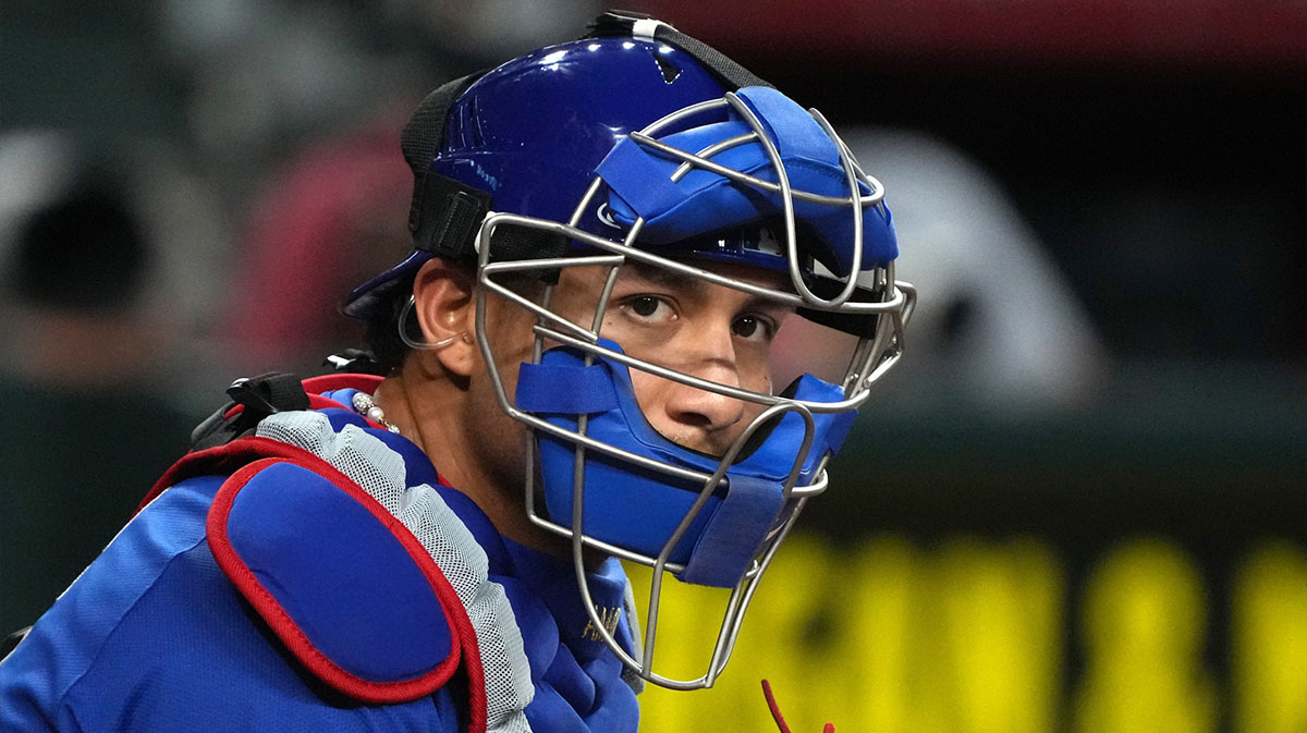 Chicago Cubs catcher Miguel Amaya (9) looks for a sign against the Arizona Diamondbacks in the seventh inning at Chase Field.