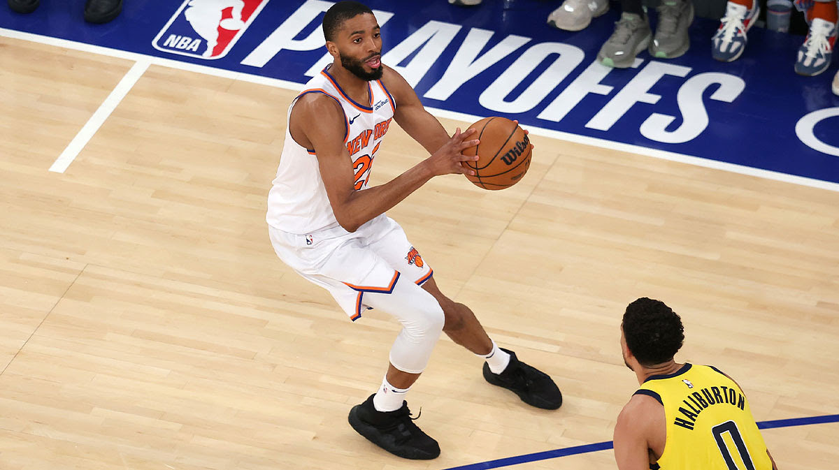 New York Knicks forward Mikal Bridges (25) controls the ball against Indiana Pacers guard Tyrese Haliburton (0) in the second quarter during game one of the eastern conference finals for the 2025 NBA Playoffs.