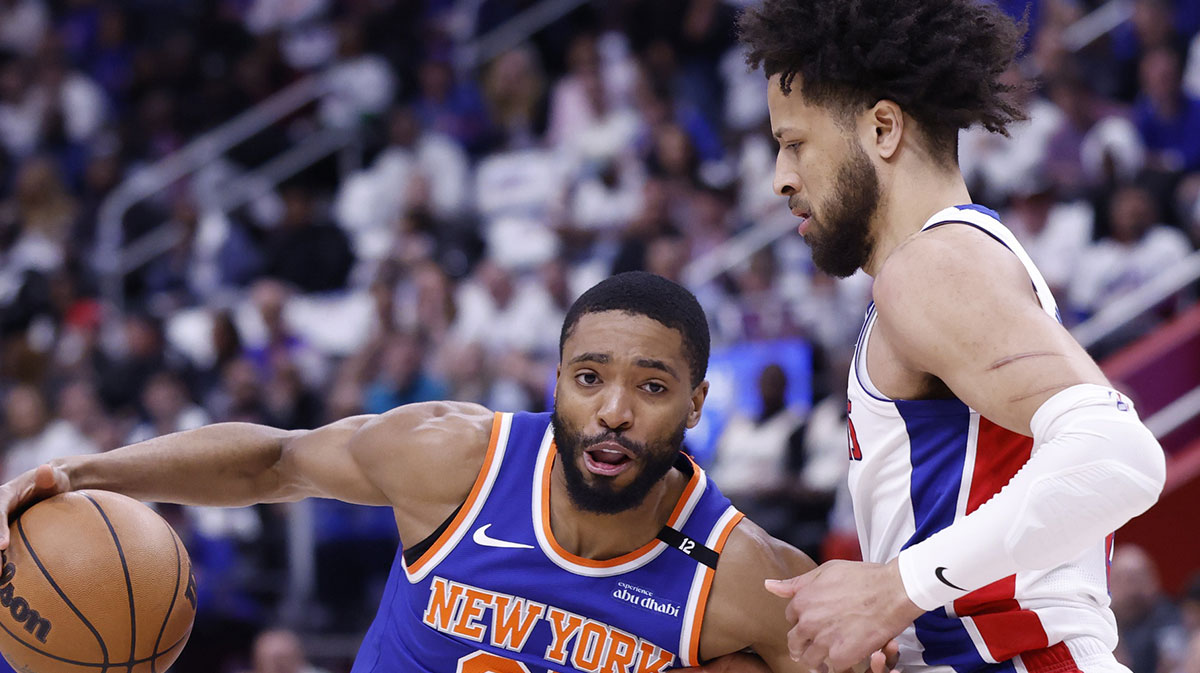 New York Knicks forward Mikal Bridges (25) is defended by Detroit Pistons guard Cade Cunningham (2) in the first half during game six of first round for the 2024 NBA Playoffs at Little Caesars Arena.