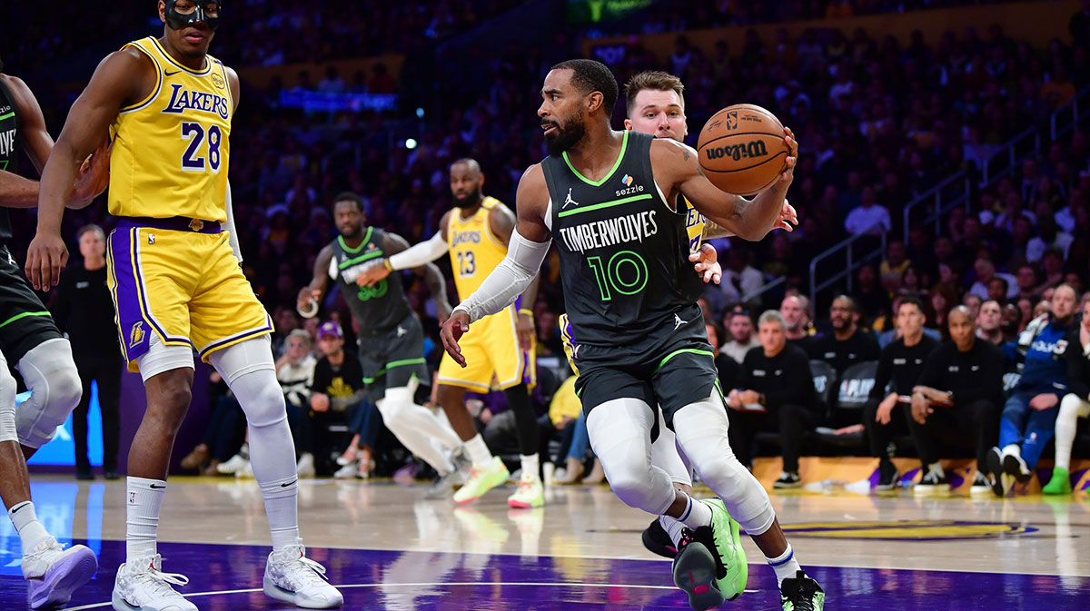 Minnesota Timberwolves guard Mike Conley (10) moves the ball against the Los Angeles Lakers during the second half in game five of first round for the 2025 NBA Playoffs at Crypto.com Arena.
