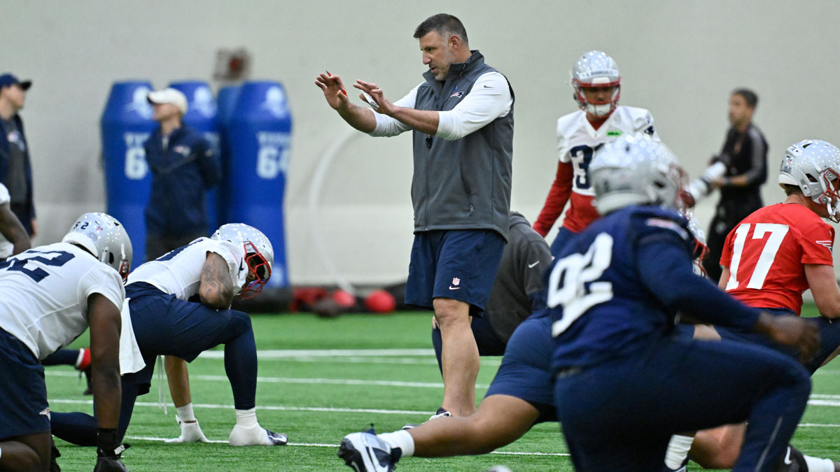 New England Patriots head coach Mike Vrabel (c) works with players at rookie camp at Gillette Stadium.