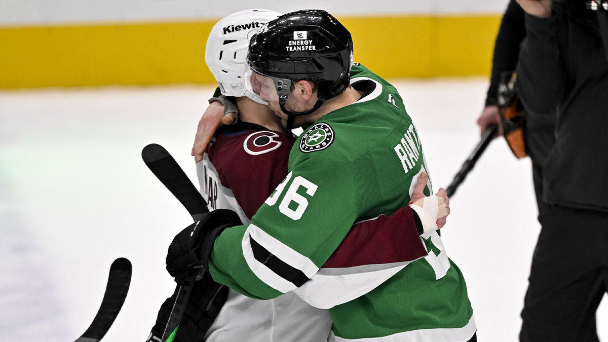 Colorado Avalanche defenseman Cale Makar (8) hugs Dallas Stars right wing Mikko Rantanen (96) after the Stars defeats the Avalanche in game seven of the first round of the 2025 Stanley Cup Playoffs at American Airlines Center.