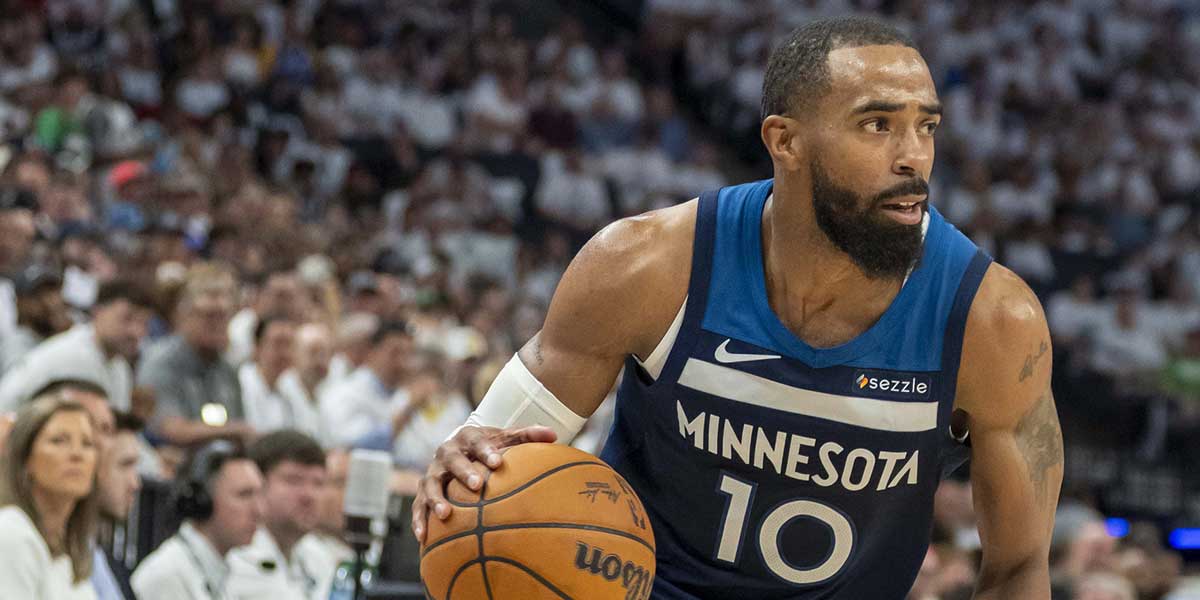 Minnesota Timberwolves guard Mike Conley (10) dribbles the ball against the Golden State Warriors in the first half during game five of the second round for the 2025 NBA Playoffs at Target Center.