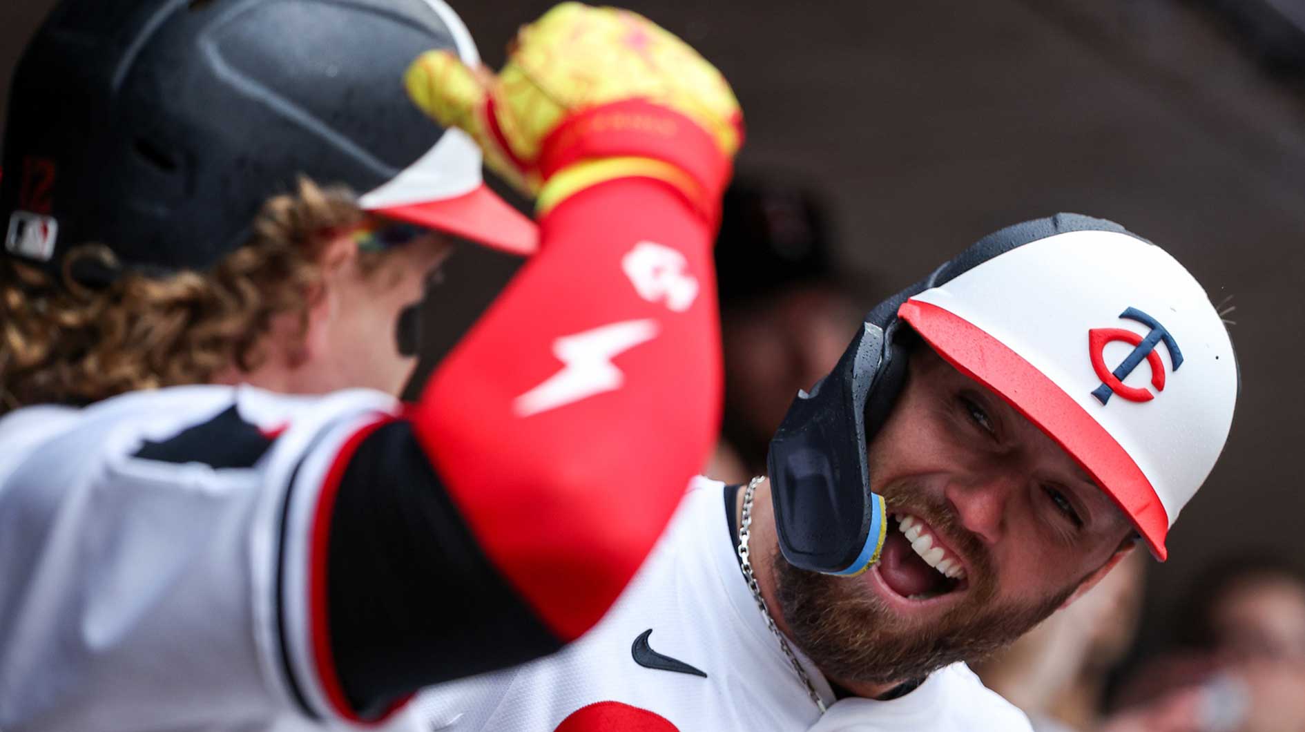 Minnesota Twins second baseman Kody Clemens (18) celebrates after scoring on a sacrifice fly hit by center fielder Harrison Bader (12) during game one of a doubleheader against the Cleveland Guardians at Target Field.