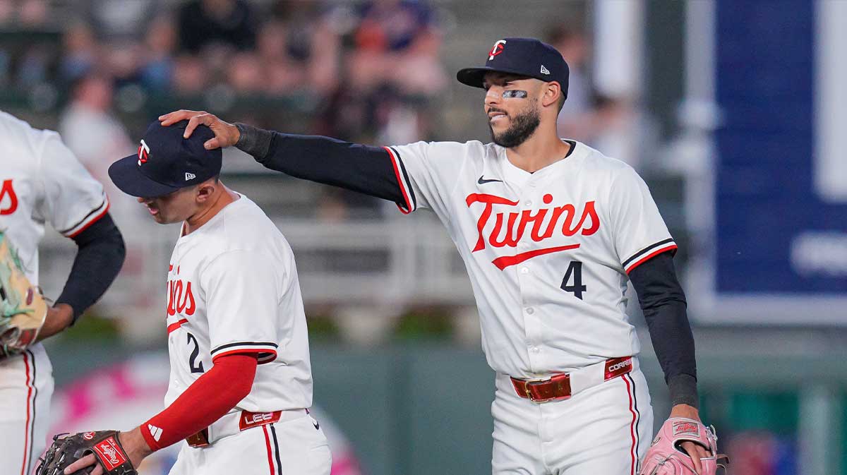 Minnesota Twins shortstop Carlos Correa (4) and second base Brooks Lee (2) celebrate after the game against the Baltimore Orioles at Target Field.